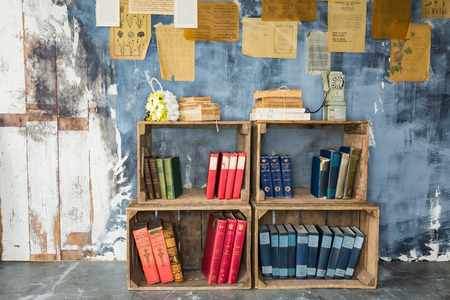 bookself on a wall in a bookcafeの写真素材