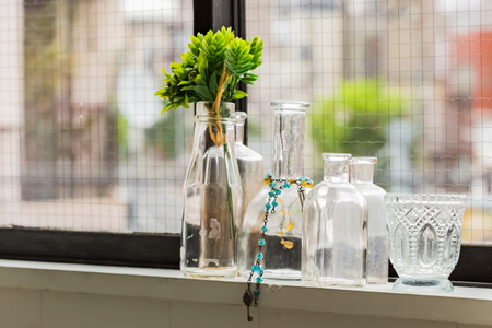 glass by the windowの写真素材
