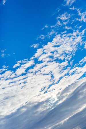 Blue sky with cloudの写真素材
