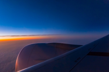 Sunrise sky on airplane