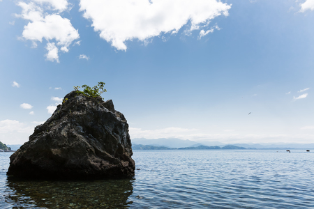 Blue sky and rockの写真素材
