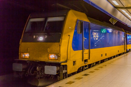 yellow dutch train in netherlands