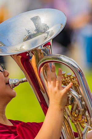 student playing euphonium, music instrucment