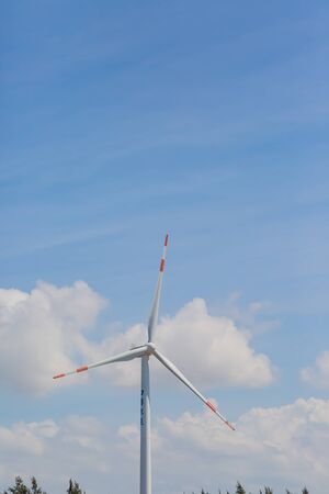 wind power generator with cloudsãの写真素材