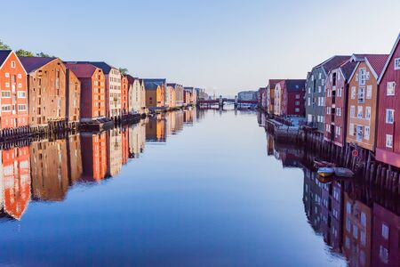 colorful warehouses in trondheim, norwayの写真素材