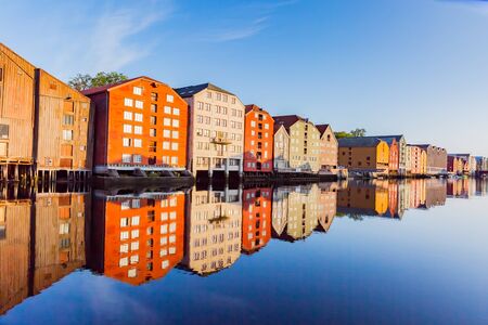 colorful warehouses in trondheim, norwayの写真素材