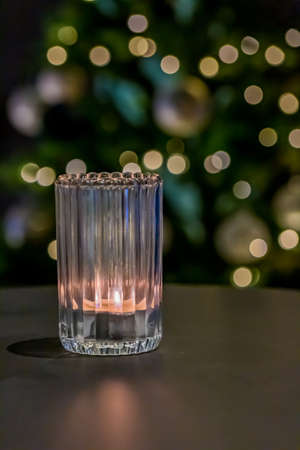candle light in glass with reflectionの写真素材