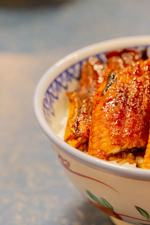 Japanese traditional cuisin, unadon, grilled eel on top of riceの写真素材