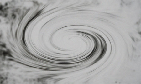 A swirling abstract background with a vortex effect, showcasing a grainy texture and dynamic motion. Perfect for adding depth and visual interest to designs.の写真素材