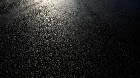 Asphalt road texture with light rays. Abstract background for design.の素材