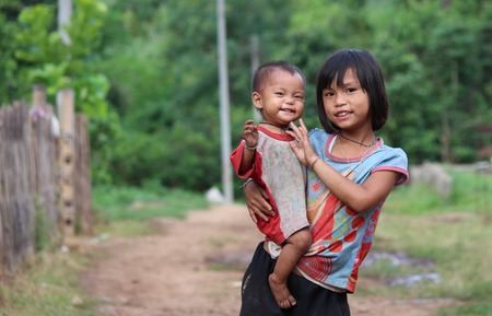 BAAN TEE CHOR CHEE , MAE CHAN, Umphang,TAK, Thailand,, Photo taken July 4,2014,Pa Ka Ka Yor kids in the mountain are smile because they are excited when they saw camera のeditorial素材