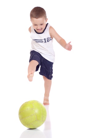 Cute little boy with a ballの写真素材