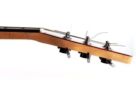 Acoustic guitar on white backgroundの写真素材