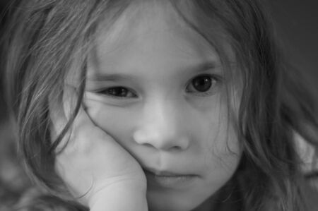 Sad and lonely little girlの写真素材