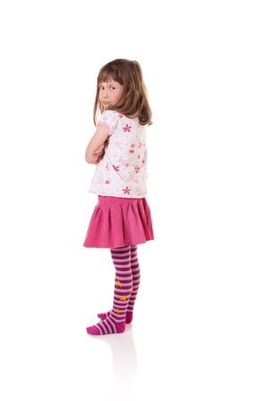 Cute little girl in a bad-tempered moodの写真素材