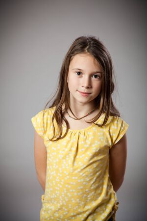 Girl in studio smiling and happyの写真素材