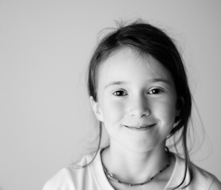 Girl in studio smiling and happyの写真素材