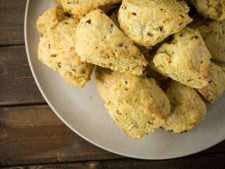 Typical homemade skones on a brown tableの写真素材