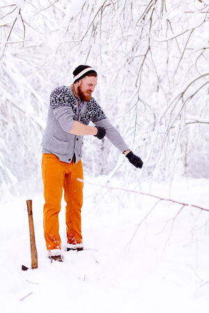 Lumberjack is preparing to cut treesの写真素材