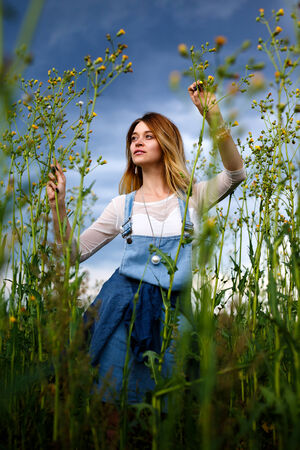 Beautiful girl on the natureの写真素材