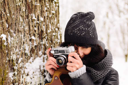 Girl in winter forest