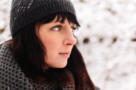 Girl in winter forestの写真素材