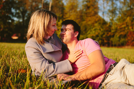 Young couple on meadowの写真素材