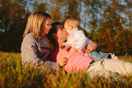 Family on the meadowの写真素材