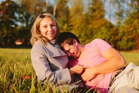 Young couple on meadowの写真素材