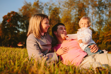 Family on the meadowの写真素材