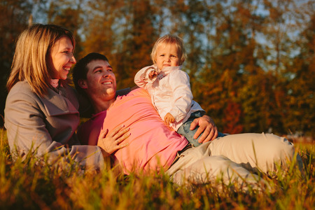 Family on the meadowの写真素材