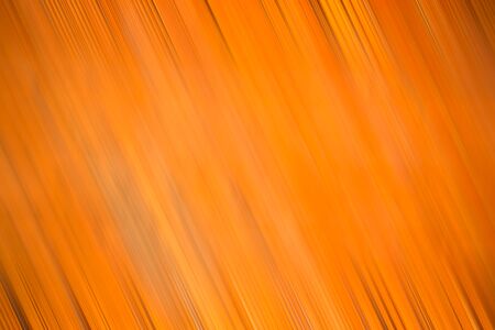 Orange background blur in motion with diagonal stripesの写真素材