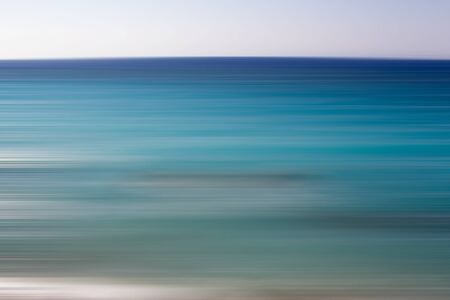 Abstract blue sea. Motion blur abstract background with horizontal stripesの写真素材