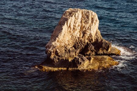 large stone in the water closeup Cyprusの写真素材