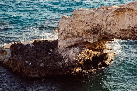 large stone in the water closeup Cyprusの写真素材
