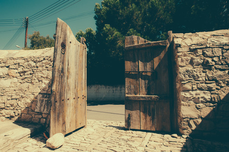 Old wooden gate in the village Laneia, Cyprusの写真素材