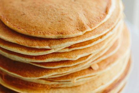 Russian pancakes close-up on a white background. color photoの写真素材
