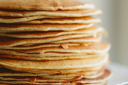 Russian pancakes close-up on a white background. color photoの写真素材