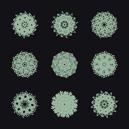 Gray different snowflakes on a black background.のイラスト素材