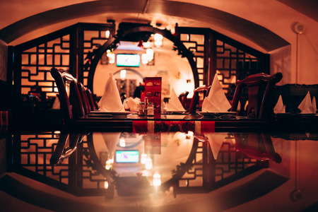 Empty served table in restaurant. Closeup photo side view.の写真素材