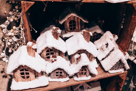Small hut with snow handmade christmas toys. Close up photo.の写真素材