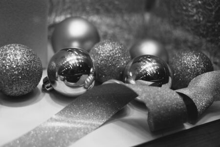 Black and white closeup photo of christmas bauble with ornaments.の写真素材