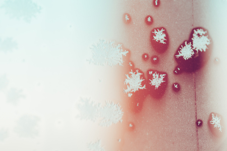 Abstract background blue and deep purple red color with snowflakes. Colorful photo.の写真素材