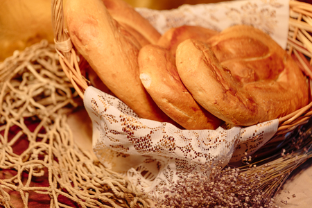 Several Armenian homemade mantakash bread in a basket. Colorful photo.の写真素材