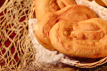 Several Armenian homemade mantakash bread in a basket. Colorful photo.の写真素材