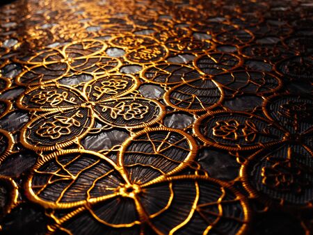 Textured cloth from patterns of gold color. Interior background.の写真素材