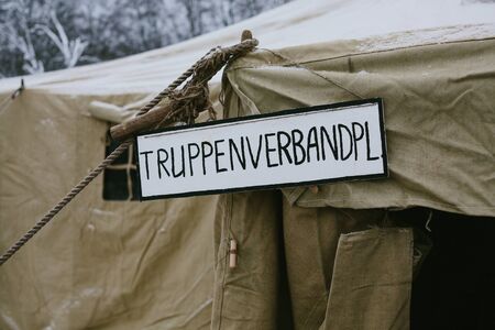 German inscription on a tent. Winter time photo.の写真素材