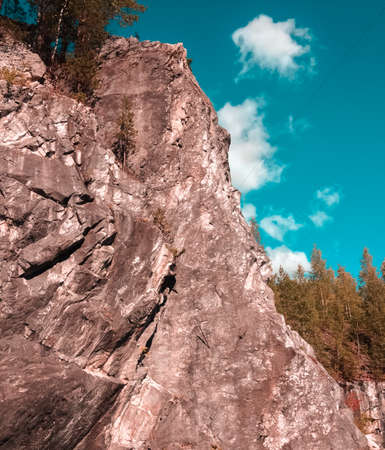 Rock against the blue sky. Outdoors photo.の写真素材