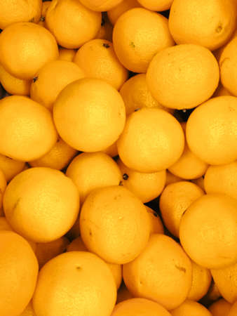 Fresh oranges on market photo. Close up photo.
