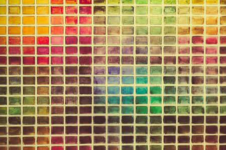 Wall of the plurality of colored squares. Close up photo.の写真素材